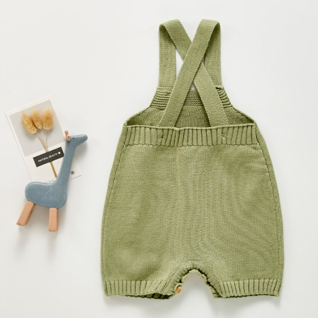 Back of Olive green color knitted overall romper with adjustable straps for baby boys, baby girls, reborn dolls, reborns and cuddle babies.