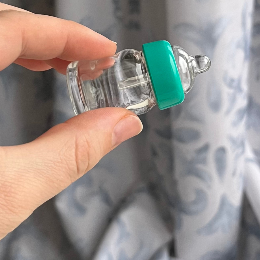 Miniature baby bottles for mini silicone pets, micro pigs, and small baby dolls.
