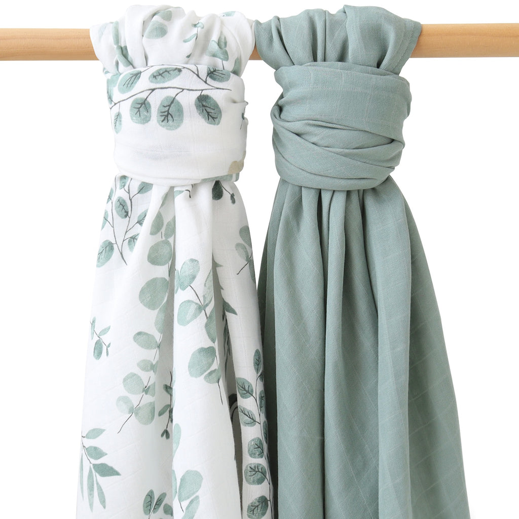 Sage green and white botanical two piece boho muslin swaddle blanket for babies, reborn dolls, and newborn photography.