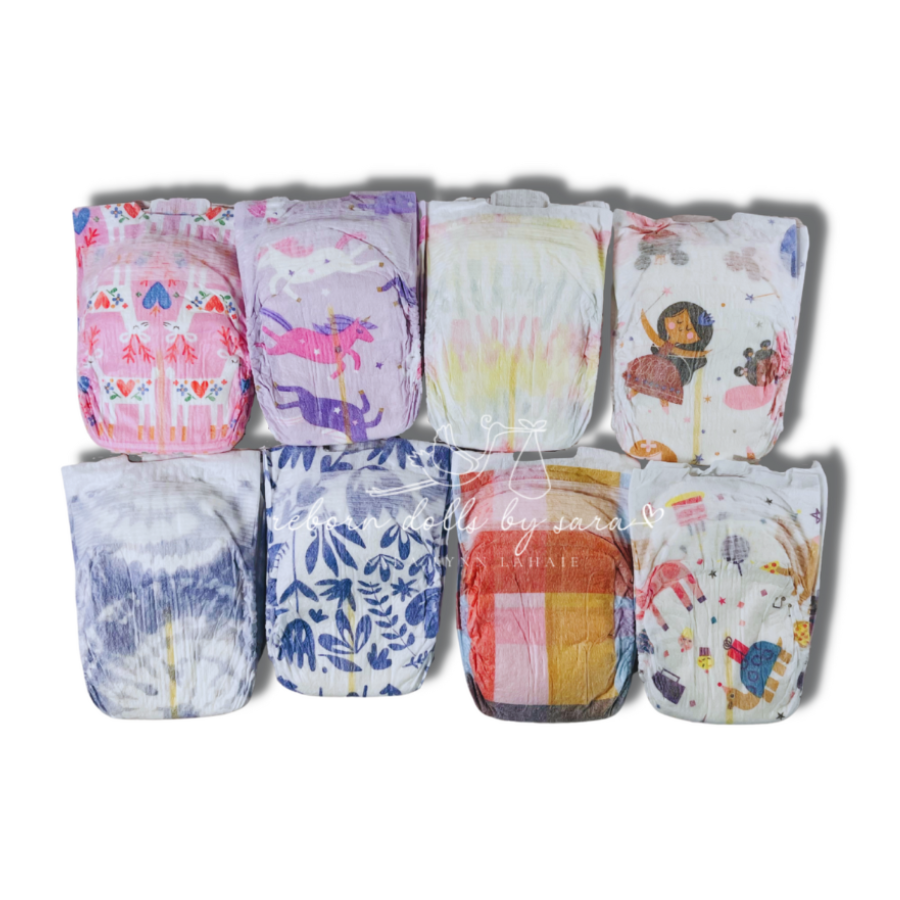Newborn baby diapers for reborn girl dolls. Diaper sampler pack for reborns. Newborn diapers for babies. Baby shower gifts. Mom to be gift. Reborn doll box opening. Reborn clothes. Reborn clothing. Baby girl. Unicorns, melons, tie-dye, fairies.