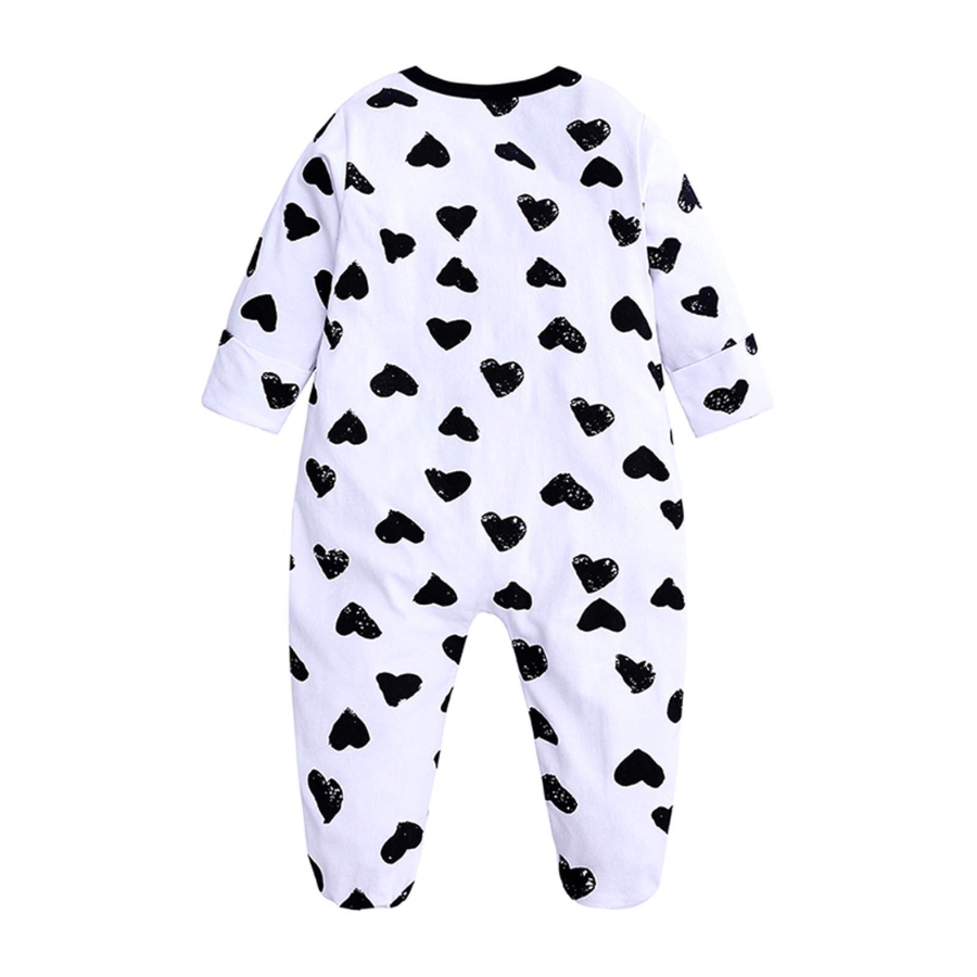 Black hearts on a white sleep n' play coverall zip-up romper with feeties for baby girls, reborn dolls, and cuddle babies.