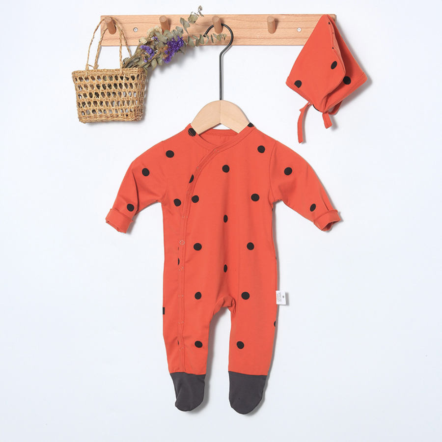 Ginger red brick coloured long-sleeve button-up romper with brown toe tips and brown dots all over it. Comes with a matching pixie bonnet hat with a drawstring for babies and reborn dolls.