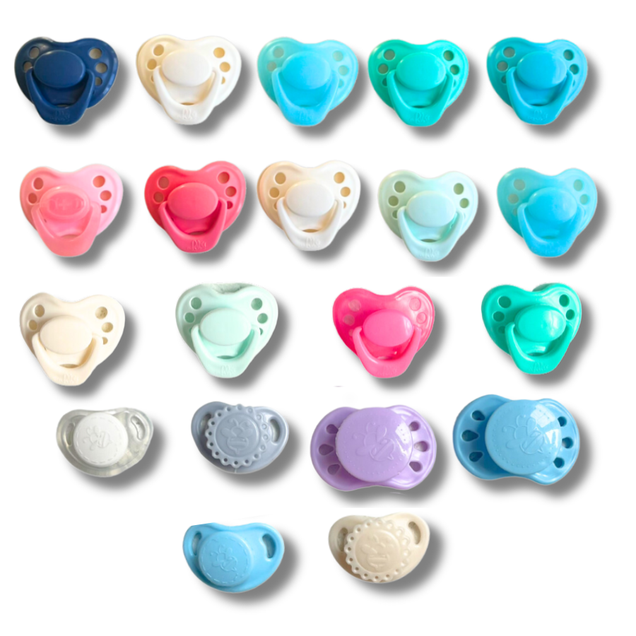 Magnetized Pacifiers for Reborn Dolls. Newborn sized pacifiers with magnets for reborns. Reborn doll magnetic pacifiers. Pacifier with magnet for reborn dolls. Reborn doll pacifiers by HoneyBug.