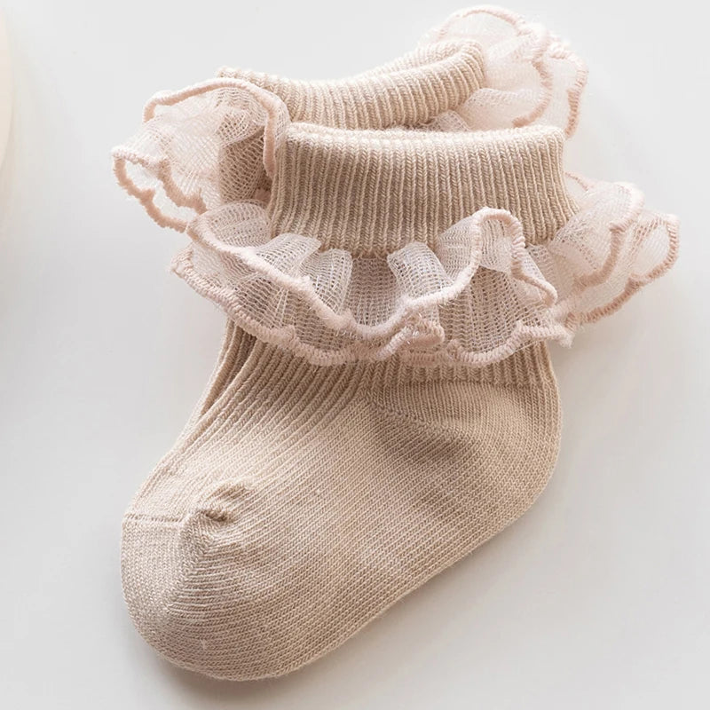 Newborn spanish vintage baby socks for girls and reborn dolls. Lace trim at the ankle.
