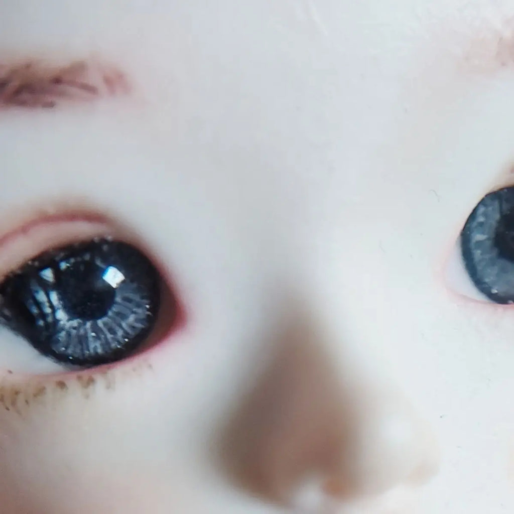 Fantasy blue eyes with a dark blue sparkly ring around them for reborn dolls. Full round plaster eyes for reborn dolls, BJD dolls, Blythe dolls etc.