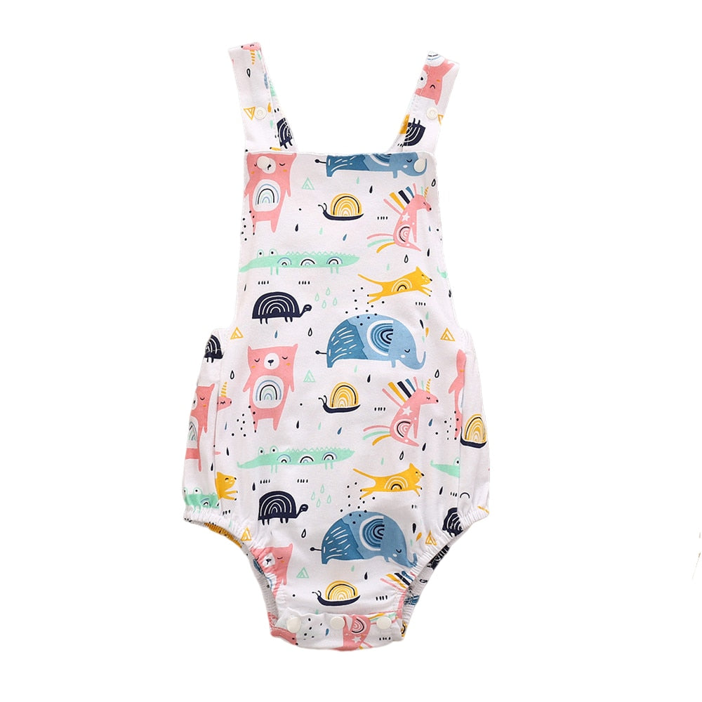White cotton newborn baby overalls rompers onesies for babies and reborn dolls featuring dinosaurs, winter bears wearing scarves, bears and rainbows and other forest animals. Dinosaurs for girls.