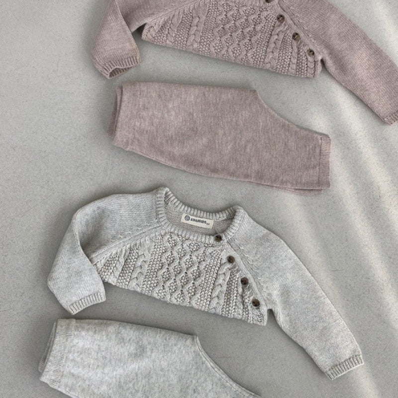     800 × 800px  Newborn baby gender neutral cable knit outfit sets in pink and grey for reborn baby girls and boys.