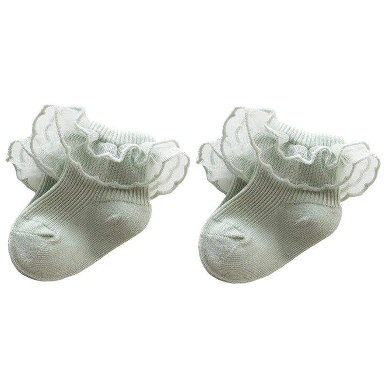 Newborn spanish vintage baby socks for girls and reborn dolls.  Lace trim at the ankle.