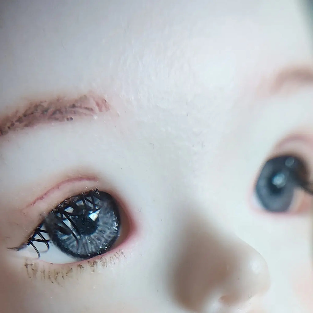 Fantasy blue eyes with a dark blue sparkly ring around them for reborn dolls. Full round plaster eyes for reborn dolls, BJD dolls, Blythe dolls etc.