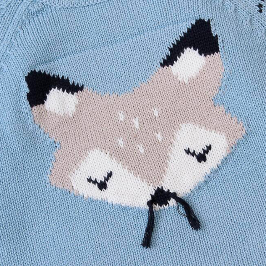 Close-up of the grey sleeping fox on a blue knitted long-sleeve sweater onesie for reborn baby dolls.