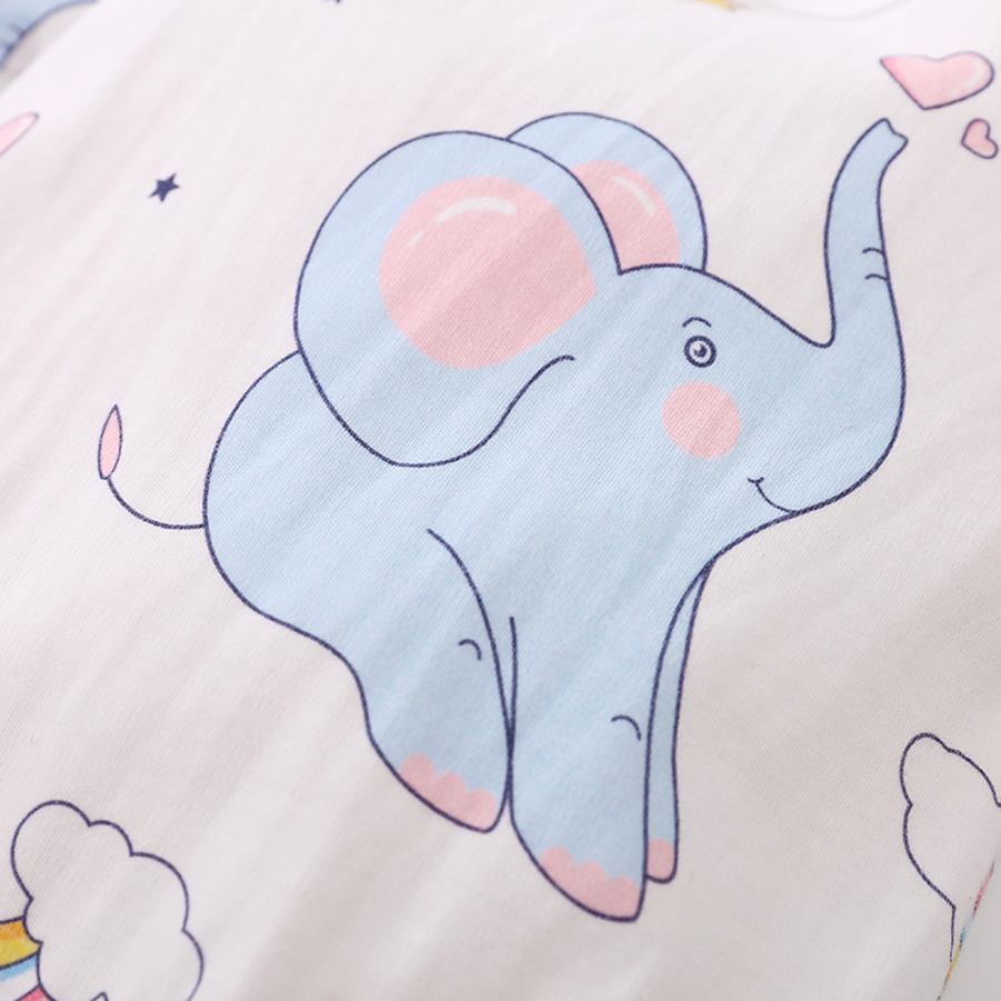 Close-up of a blue elephant with pink nails, cheeks and ears on a white long-sleeve baby romper with blue elephants, rainbows, flamingos, stars and hearts on it for reborn baby dolls.