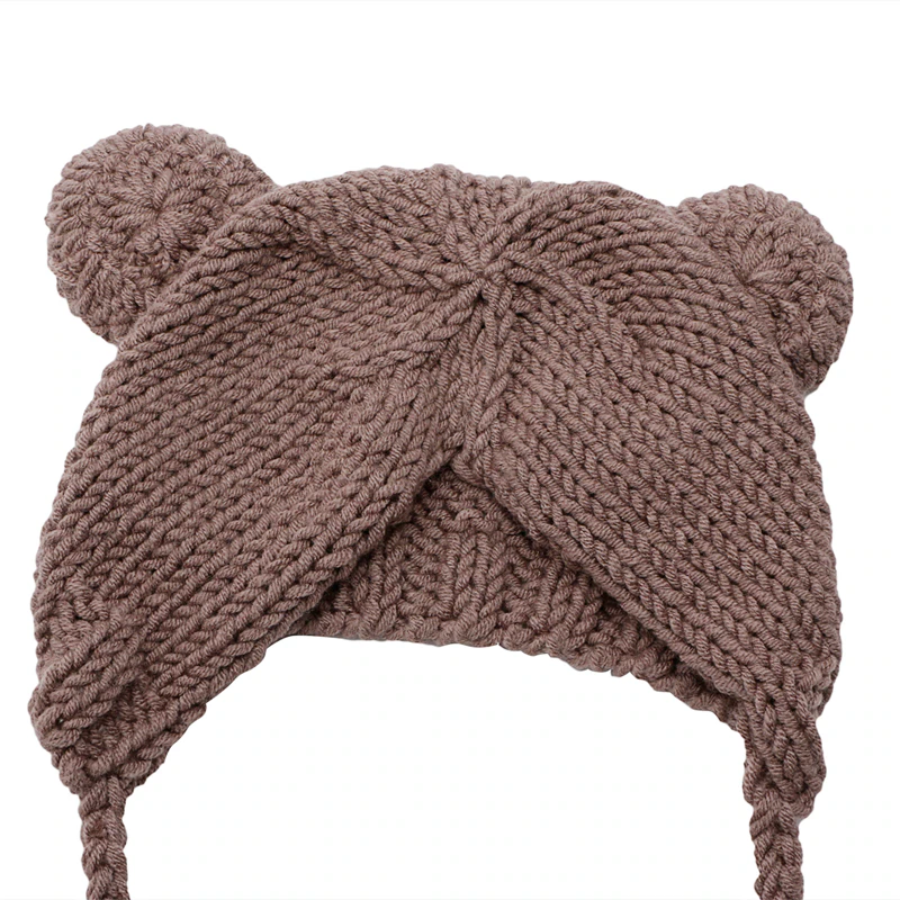 Back of the brown Lovey hand knitted newborn baby bear hat with matching teddy.
