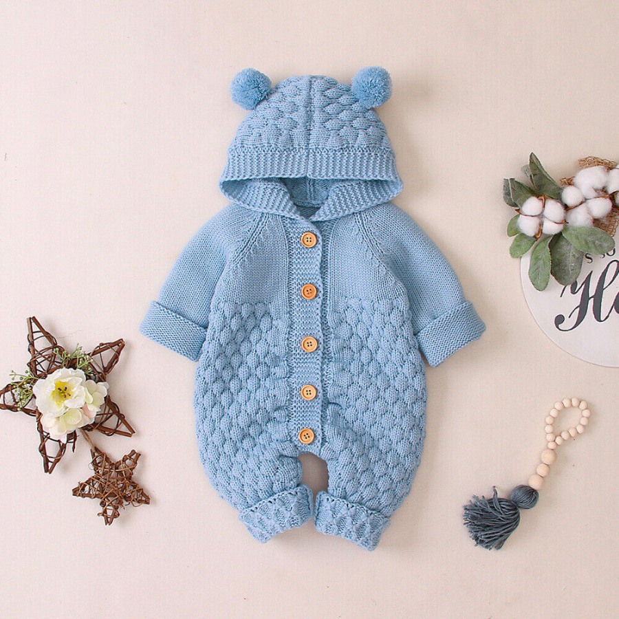 Blue knitted long-sleeve button-down teddy bear romper with hood and two pompoms for reborn baby dolls.