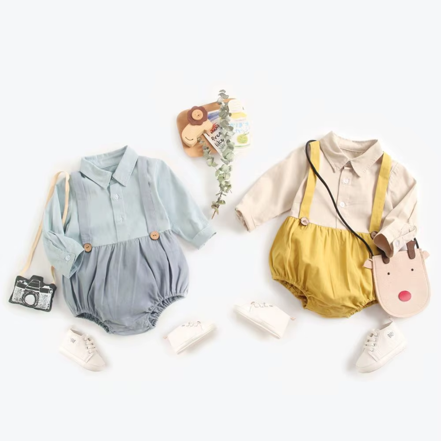 The Allen and Wells Spanish Baby Boy Bubble Romper for reborn babies and dolls.  blue collared baby shirt and beige collared longsleeve with long sleeves and built in bubble romper overalls for newborn boys and reborn dolls.