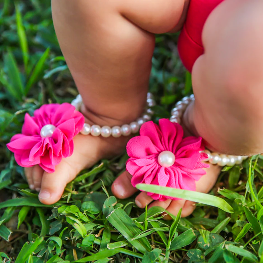 Hot pink Tootsie Blooms Newborn Baby Barefoot Sandals Pearl with flowers dotted in pearls for reborn dolls.
