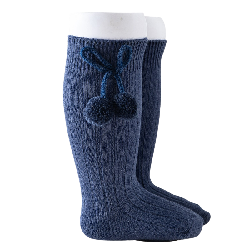 Dark blue knee-high Spanish baby socks with pompoms for reborn baby dolls boys and girls.