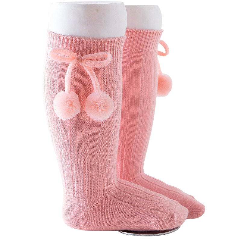 PInk knee-high Spanish baby socks with pompoms for reborn baby dolls boys and girls.