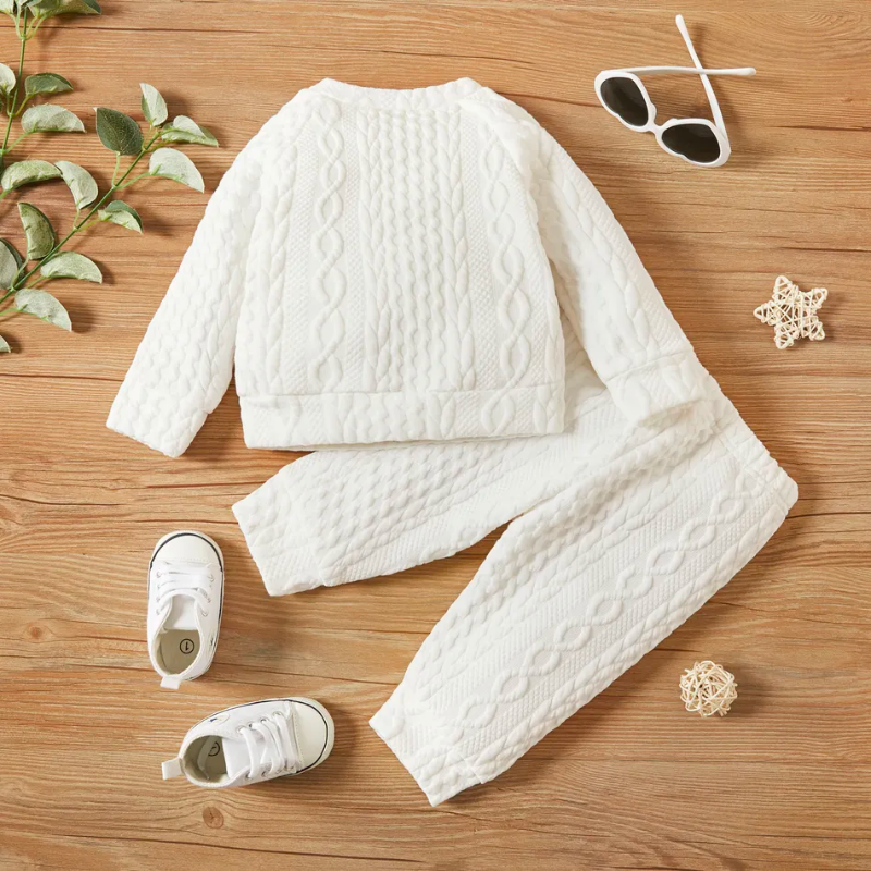 White knitted pullover two piece outfit with matching pants for reborn dolls or cuddle babies or newborn babies. Hand knit newborn outfit.
