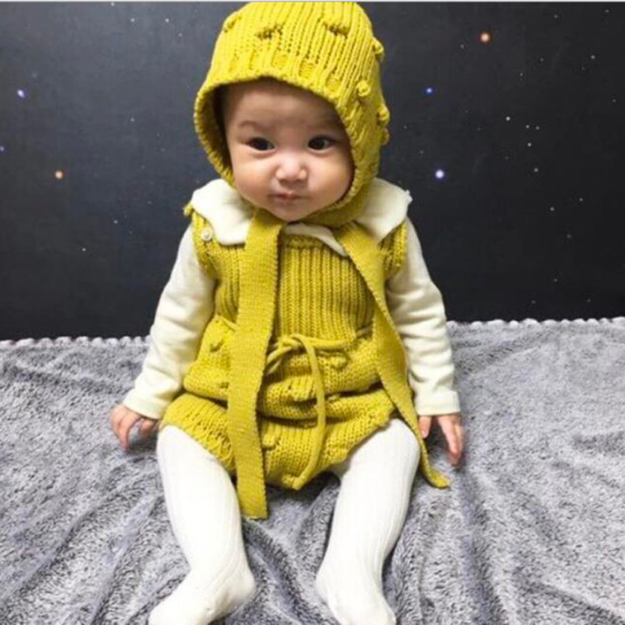 Mustard yellow knitted overall onesie with dots and matching bonnet for baby girls and reborn dolls.