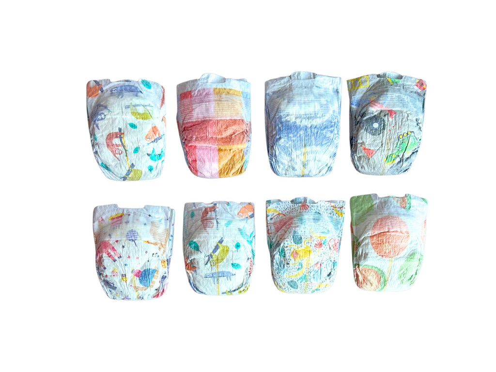 Newborn sized reborn baby doll diapers for boys. Diaper pack sampler for reborns. Reborning supplies. Reborn doll clothes. Reborn clothing and accessories. Colourful baby boy diaper. Summer pack.
