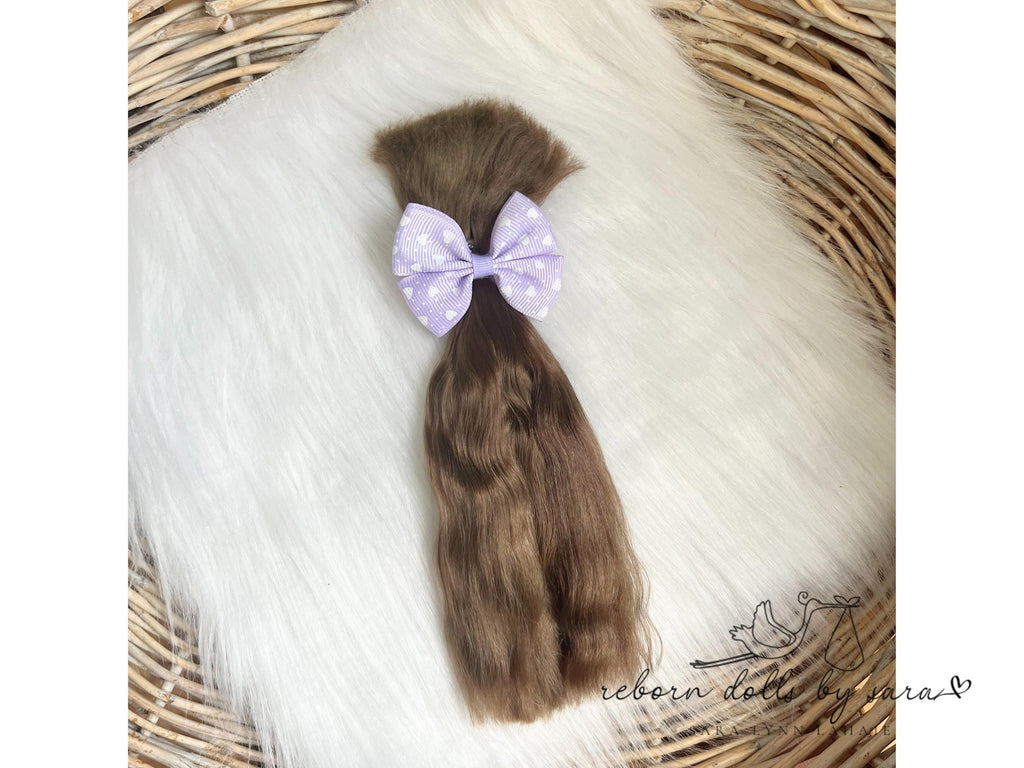 Premium yearling angora goat mohair for rooting highly realistic ooak dolls.  Medium light natural baby brown. Reborning supplies doll hair reborns. High end reborns. Reborn Dolls by Sara.