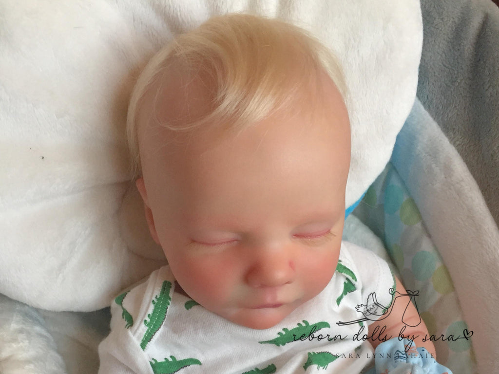 Premium yearling angora goat mohair for rooting highly realistic ooak dolls.  Natural gold golden Baby Blonde blond.
 Reborning supplies doll hair reborns. High end reborns. Reborn Dolls by Sara.