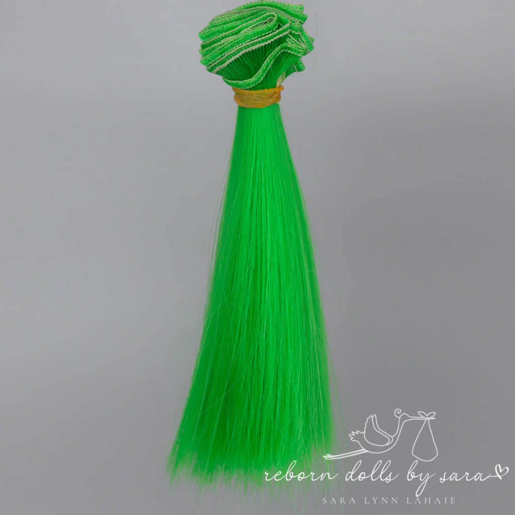 Lime green synthetic doll hair for alternative reborn dolls 15cm long.