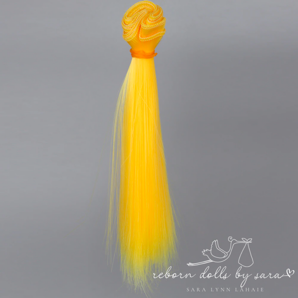 Yellow synthetic doll hair for alternative reborn dolls 15cm long. 