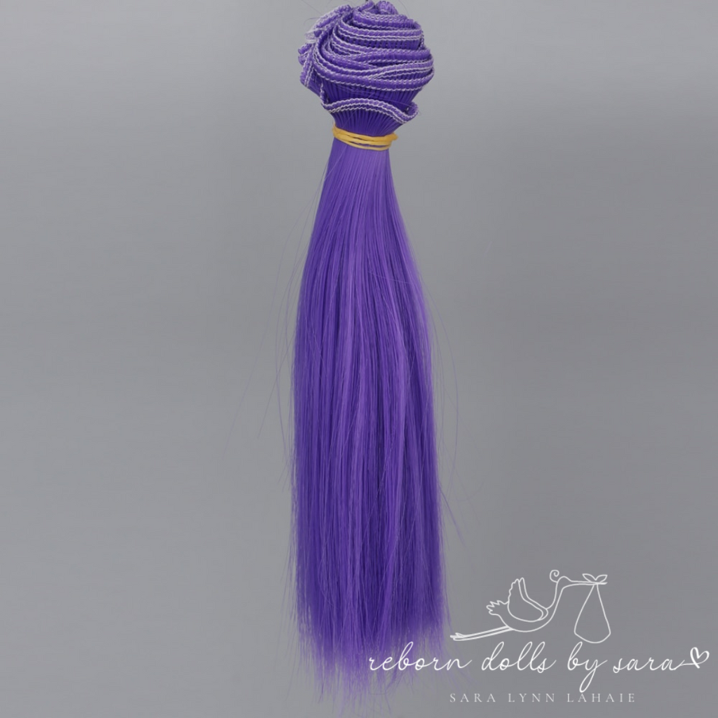 Violet purple synthetic doll hair for alternative reborn dolls 15cm long.