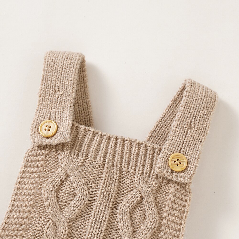 Beige coloured Spanish knitted shortalls with matching bonnet for babies and reborn dolls.