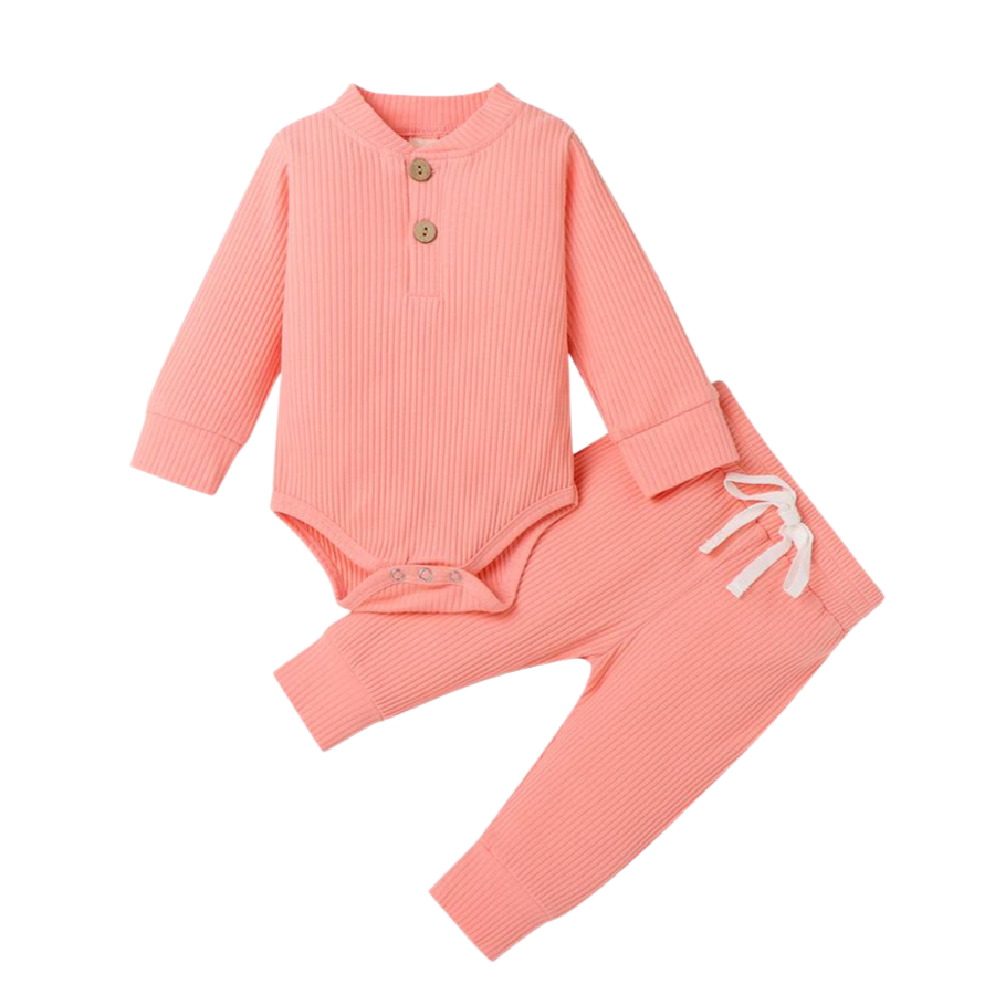 Pink coloured jogging suit for newborns and reborn baby dolls.