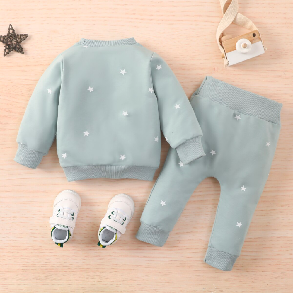 Back of a Mint green jogging suit with white stars for newborn babies and reborn baby dolls.