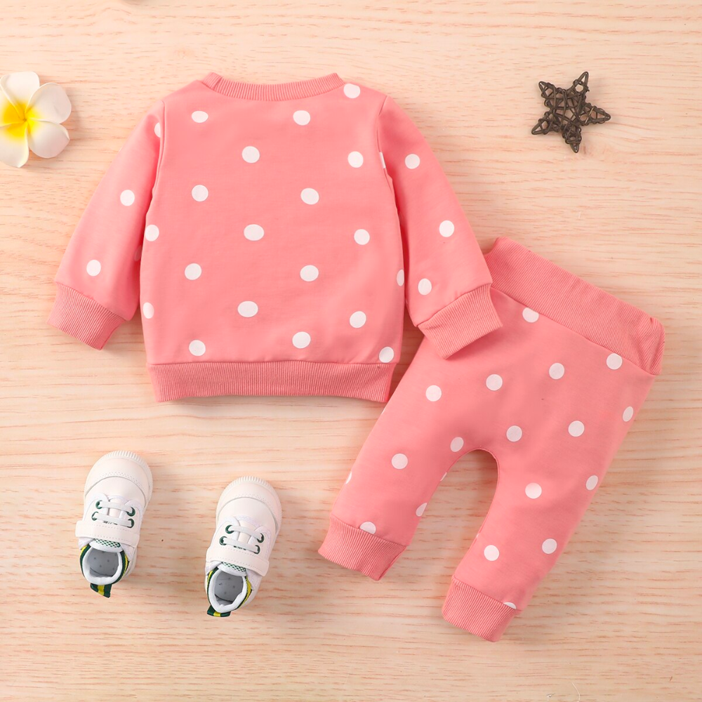Back of a Pink jogging suit with white polka dots for newborn babies and reborn baby dolls.