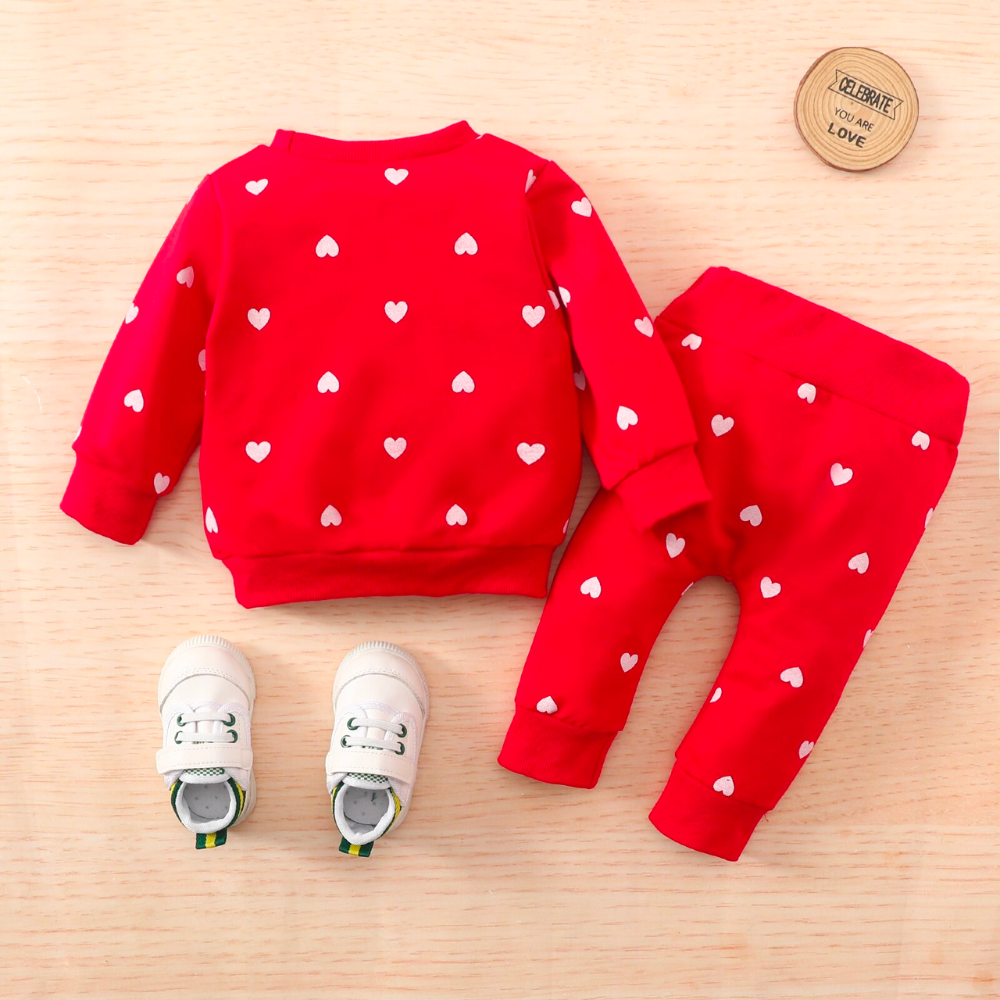 Back of a Red jogging suit with white hearts for newborn babies and reborn baby dolls.