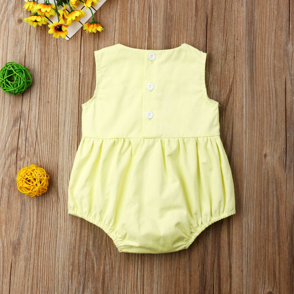 Back of yellow Spanish baby clothing bubble romper for reborns and babies: reborn doll clothing