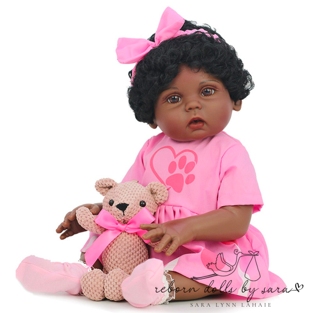 Black African American ethnic aa reborn baby girl doll Nala for adoption. This lifelike doll can drink and wet! Cheap affordable reborns for sale.