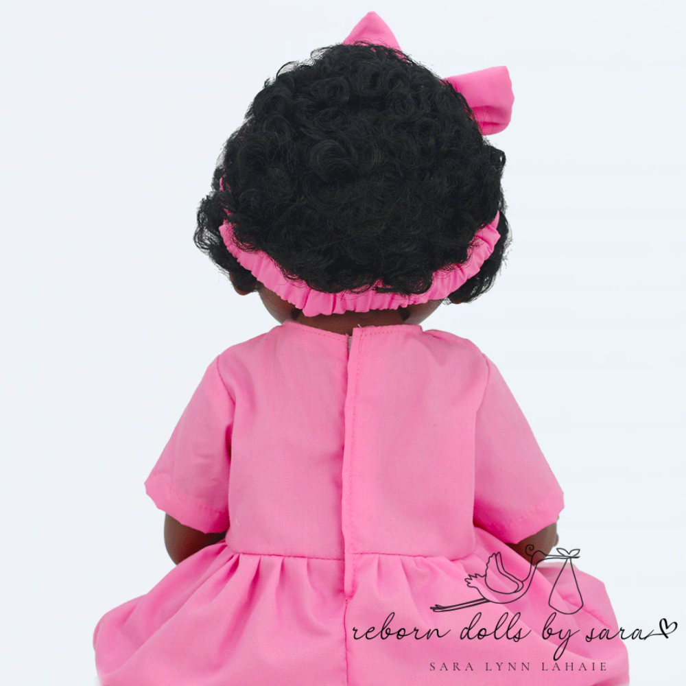Black African American ethnic aa reborn baby girl doll Nala for adoption. This lifelike doll can drink and wet! Cheap affordable reborns for sale.