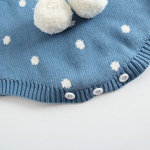 close-up of crotch on blue Knit bubble rompers with white peter pan collars, a drawstring around the waist with two pompoms, and buttons at the crotch and back of neck. Reborn Doll Clothes and Baby Clothing.