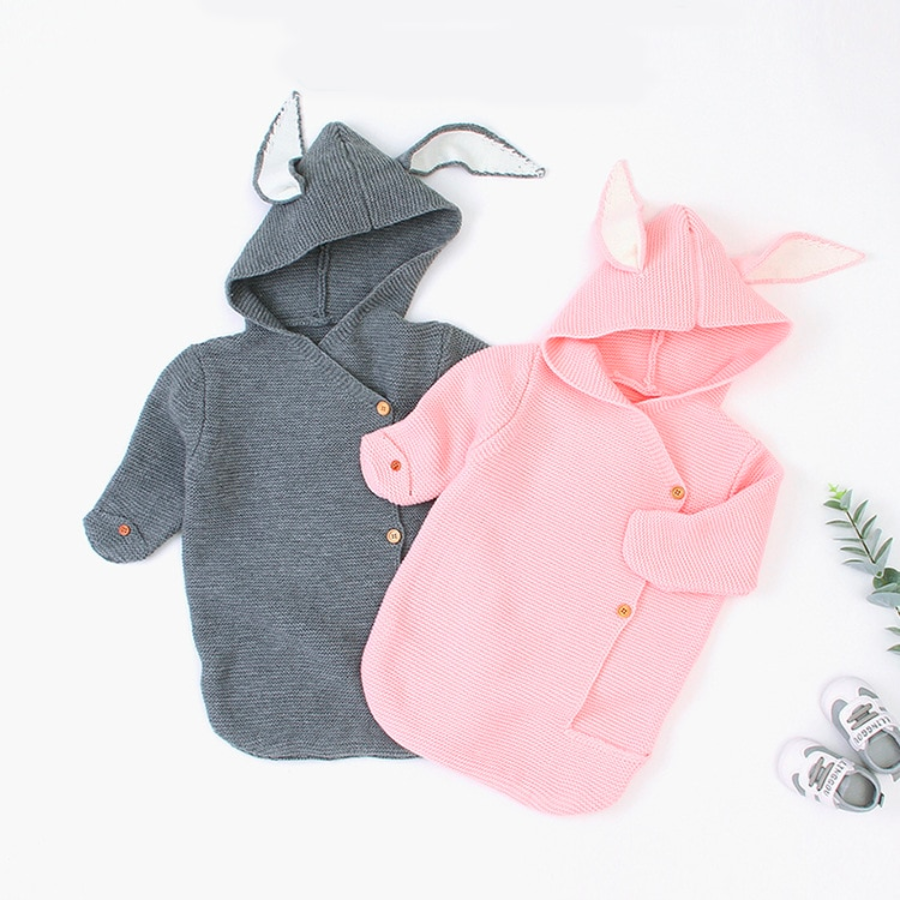 Pink and grey knitted bunny rabbit sleep sacks sleeping bags for newborn babies and reborn dolls.