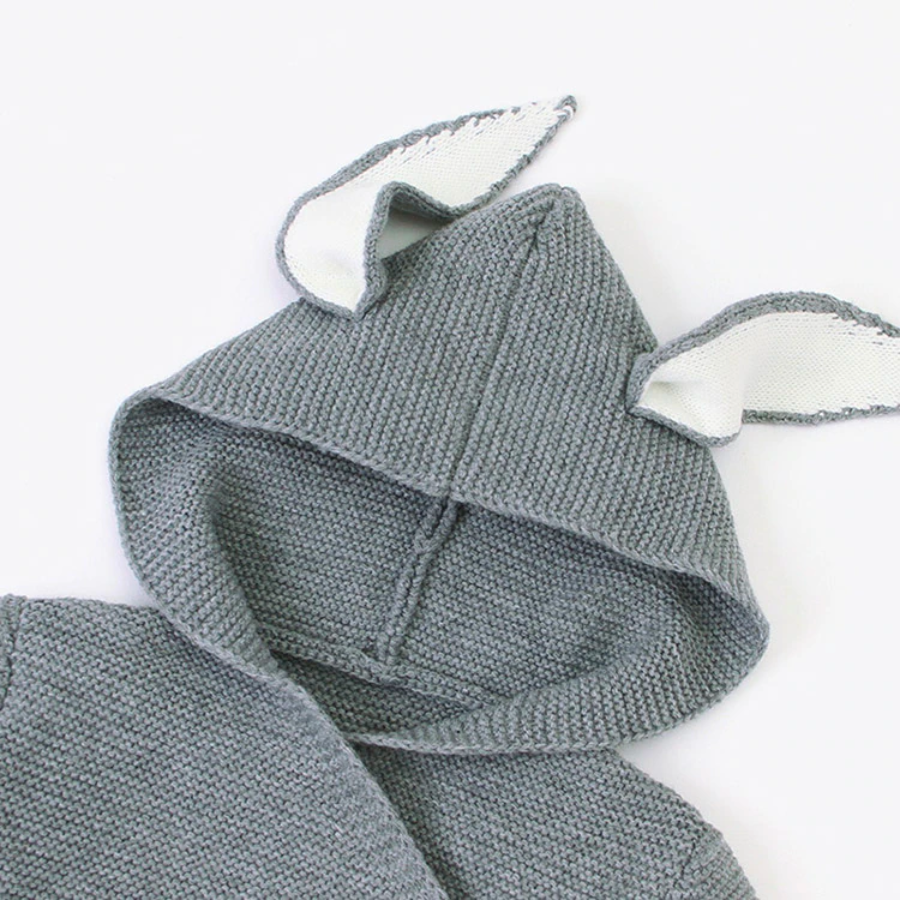 Close-up of a grey hood on a grey knitted bunny rabbit sleep sacks sleeping bags for newborn babies and reborn dolls.