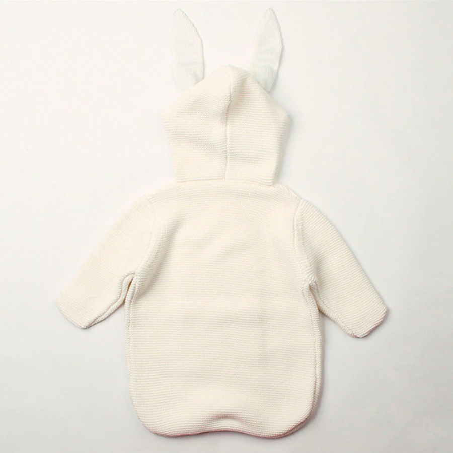 Back of a white knitted bunny rabbit sleep sacks sleeping bags for newborn babies and reborn dolls.