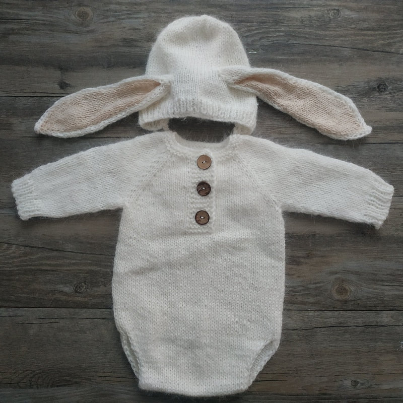 White knitted bunny rabbit newborn photography hat and long-sleeve onesie bodysuit for reborn baby dolls.