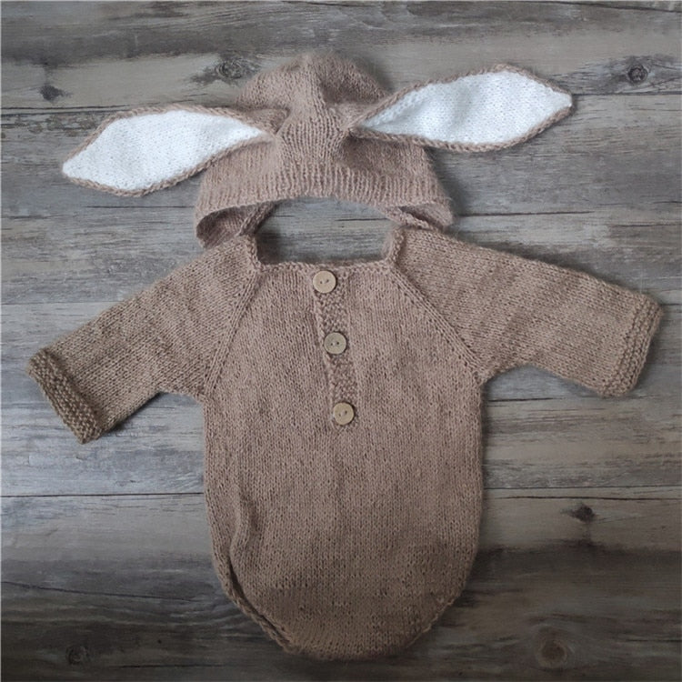 Light beige brown knitted bunny rabbit newborn photography hat and long-sleeve onesie bodysuit for reborn baby dolls.