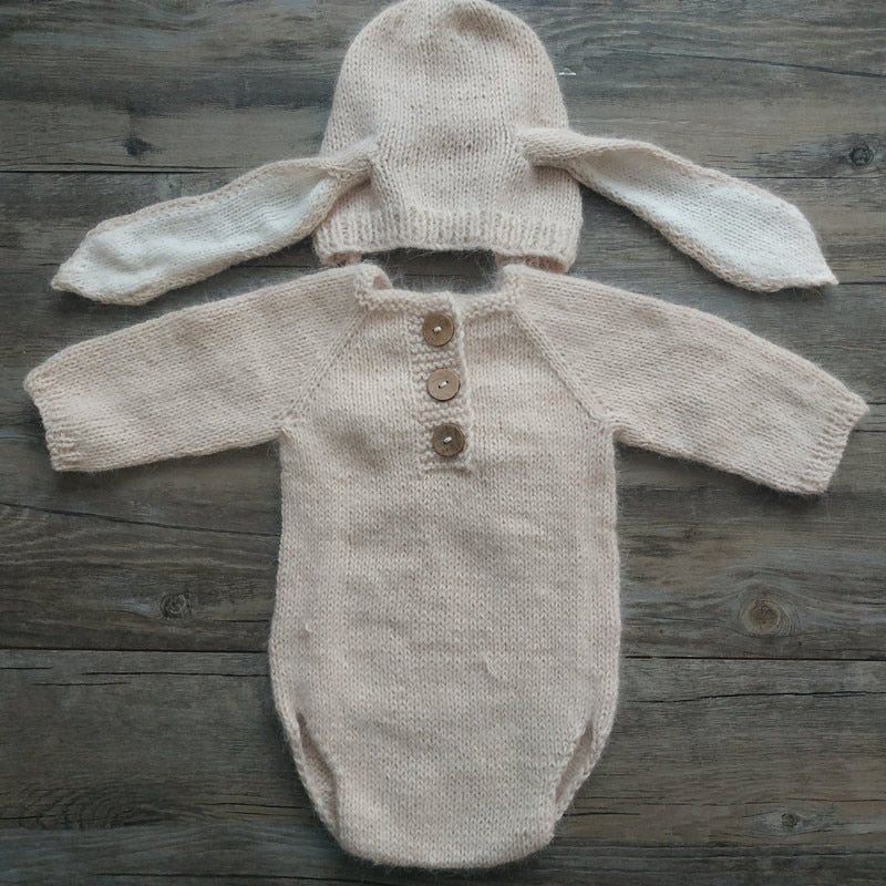 Light beige khaki knitted bunny rabbit newborn photography hat and long-sleeve onesie bodysuit for reborn baby dolls.