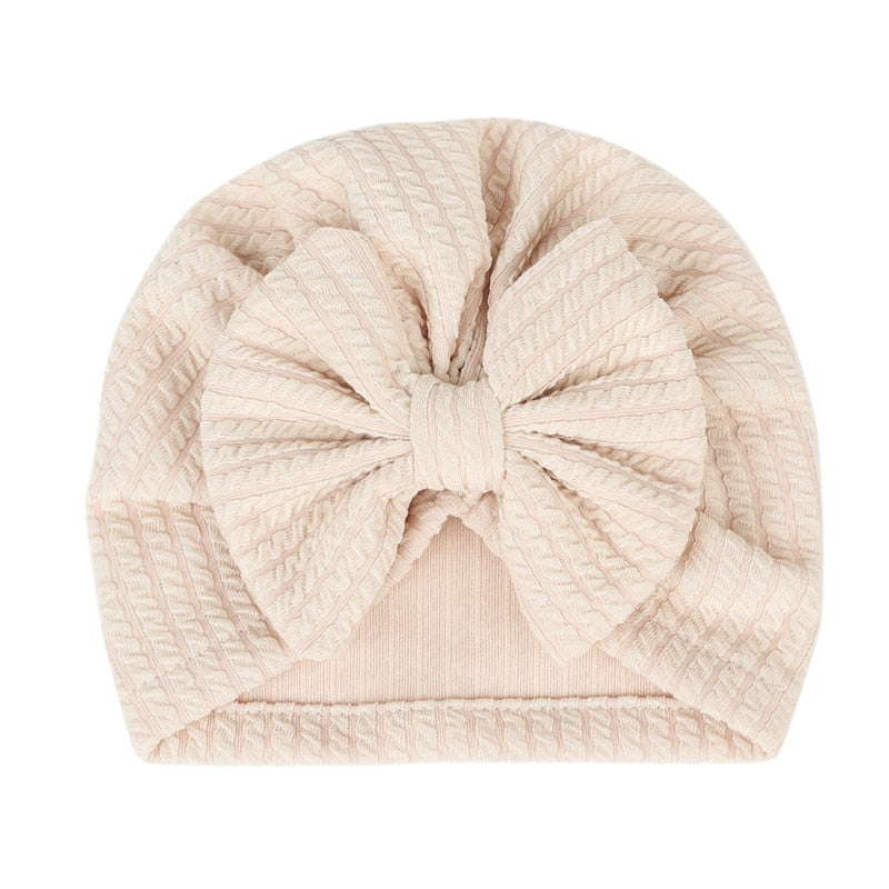 Off-white Waffle Knit Baby Turbans with Large Bows for Newborns and Reborn Dolls.