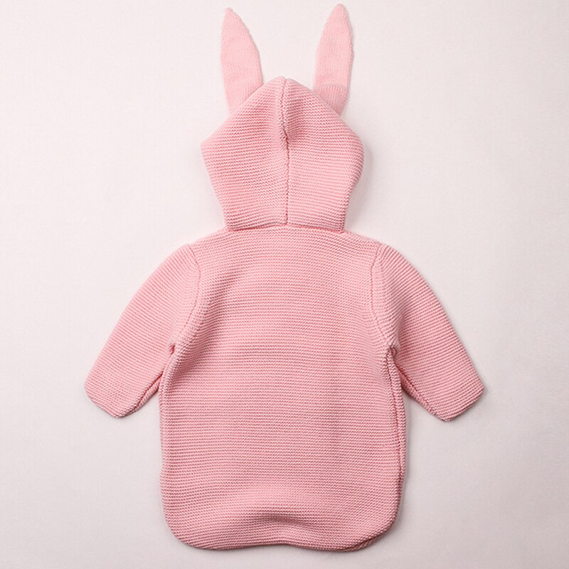 Back of a pink knitted bunny rabbit sleep sacks sleeping bags for newborn babies and reborn dolls.