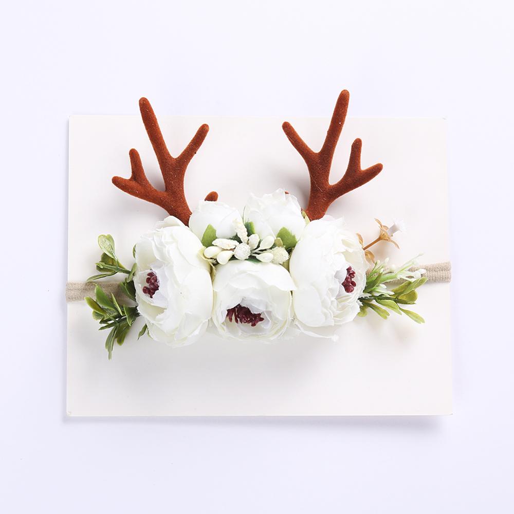 Baby deer antler headbands with faux flowers for reborn dolls and newborn baby photoshoots.