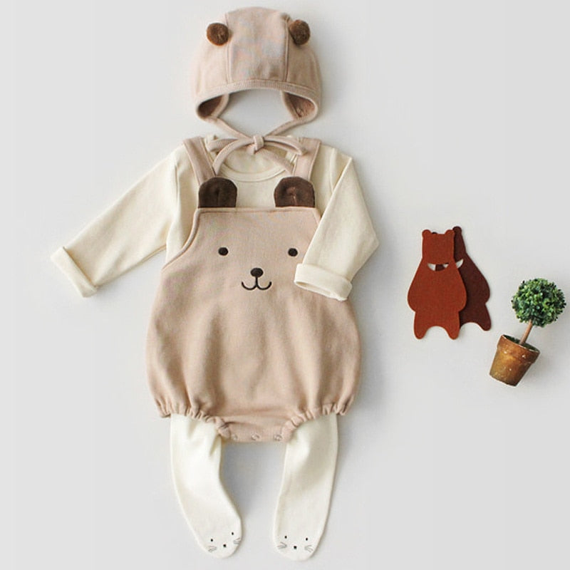 Spanish Baby Clothing Beige Teddy Bear Overall Bubble Romper with Matching Bonnet, with two brown pompoms, an off-white long-sleeve sweater and offwhite leggings for Reborn Dolls Doll Clothing