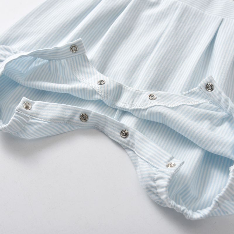 Close-up of the crotch snap closures on the White and baby blue striped Spanish Baby Bubble Romper for Reborn Dolls with a Peter Pan Collar.