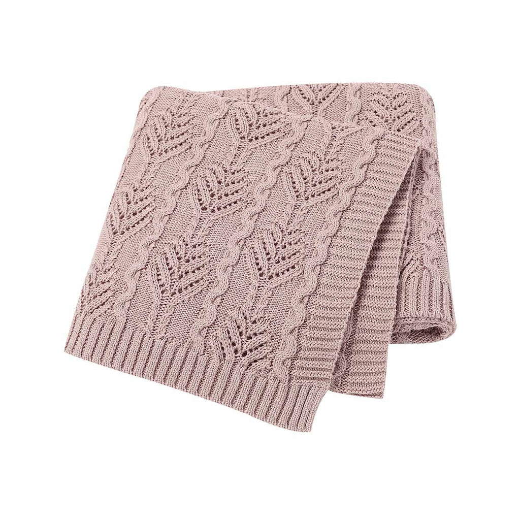 Blush pink coloured Fern Gully knitted baby blanket for reborn dolls and newborn babies.